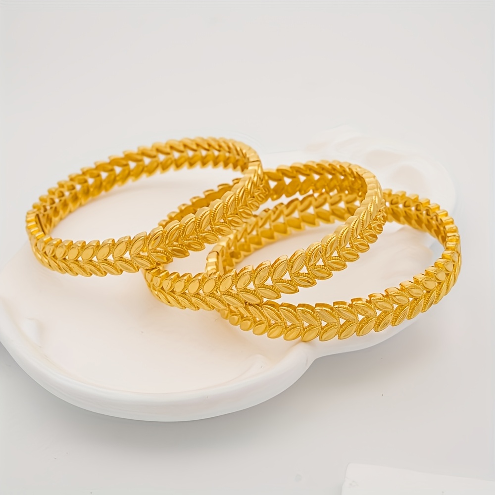 Adjustable Cuff Bracelet with Intricate Leaf Pattern